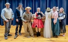 The Valentine Players are ready to present A Golden Fleecing with their first presentation, April 24, at 7:00 p.m., and again April 27, at 3:00 p.m. Pictured are from L to R: Sly Scavenger, Jack Liddy; Stanley Sotou, Jim Liddy; Tumbleweed, Robin Roth; Miss Tinkle Toes, Cyndi Dean; Big Bad Granny, Karen Bice; Sarah Sweetlower, Shiloh Hanzlicek; Crazy Clara, Jean Vackiner. Directing the production is John Hanzlicek. Photo by John Hanzlicek