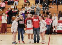 Cinch Miller has been awarded the Huskerland Preps C2 Diamond in the Rough. A Diamond in the Rough is a Nebraska football player who shows great potential but might not have received much attention or hype. They are a ' diamond in the rough.' He was presented this award at the basketball game Friday, January 10, 2025. Congratulations, Cinch! Pictured from L to R are Cinch with his family: Tygh, Erin, Cinch, Randy, and Tierney. Photo by Nina Maria Nelson
