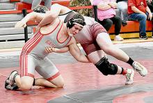 Thane Taylor placed fourth and wrestled at 215#.