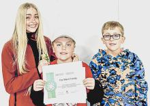 Rylee, Tate, and Rhett Ward received the James Sexson Memorial Herdsmanship Award, Individual Family.