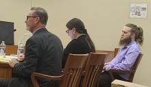 Kevin Kilmer, far right sits with his attorney Chief Counsel with the Nebraska Commission on Public Advocacy Todd Lancaster, and paralegal Shara Aden.