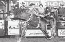 Bareback rider Garrett Shadbolt, just two years removed from being named the PRCA’s Rookie of the Year, has qualified for the National Finals Rodeo for the first time in his career. He is from Merriman, Nebraska, and competed in wrestling and rodeo at Doane College. Photo by Ric Andersen