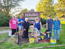 Pictured are Rotarians from L to R: Ronna Morse, Jeanie Cozad, Regina Osburn, Mary Henderson, Ray Scholl, Nadeane Allard, Todd Madison, and Joan Johnson clearing the way for next spring. Not pictured is Ann Neiffer.