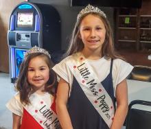 Pictured are Little Miss Poppy in waiting Isa Foster and her sister, Little Miss Poppy Laramie Foster, daughters of Mark and Julie Foster.