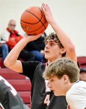 Dominic Beebout squares up for a free throw during their final round of the SWC vs. McCook. Photo by Harvey Dean Fast Horse