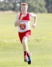 Isaac Utecht ran the XC course in 22.22. Photo by Amanda Long