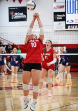 Top, Alex Monroe #10 hitting the ball back to Gering during the Mc Cook Invitational Tournament. Bottom, Rylinn Feeken #9 passing the ball to Devahney Belville #11 against Maywood Hay Center.