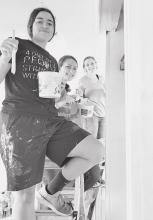 Abby Busenitz of Nenzel, is busy painting the warehouse with a new coat of Light, so to speak!