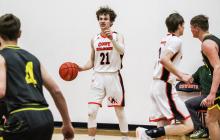 CK senior Jasper Roseberry setting up the offense during subdistrict basketball action versus Hay Springs. The Cowboys defeated the Hawks 65-63. Photos by Zoey Dorian