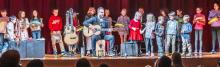 Daniel Martinez included youth in his show Sunday, October 26, 2025. He invited them to use some of his unique instruments, and pictured above, the fourth grade class - his core group - used instruments that they made with Daniel during his residency; they made rain sticks and drums. Photos by Laura Vroman