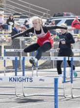 Becca McGinley took first place in the 100 Meter Hurdles. Photos by Rod Worrell