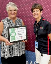 Rhonda Cherry, Cherry County 4-H Family &amp; Consumer Sciences Committee member and Quilts of Valor Coordinator, was honored at the State Fair for being an Outstanding Volunteer in 2024.
