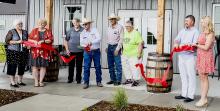 Pictured at the Niobrara Valley Vineyards Ribbon Cutting are from L to R: Nadeane Allard, Carolyn Moore, Cindy Nollette, Greg Nollette, Tim Nollette, Terri Nollette, Zane Limbach, and Jenny Moore.