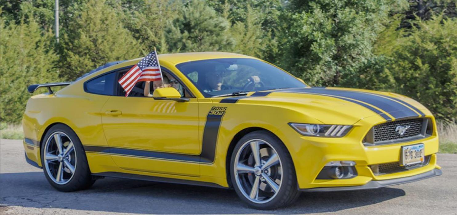 This Ford Mustang was showing its American Spirit! Long may She wave! Photos by Laura Vroman