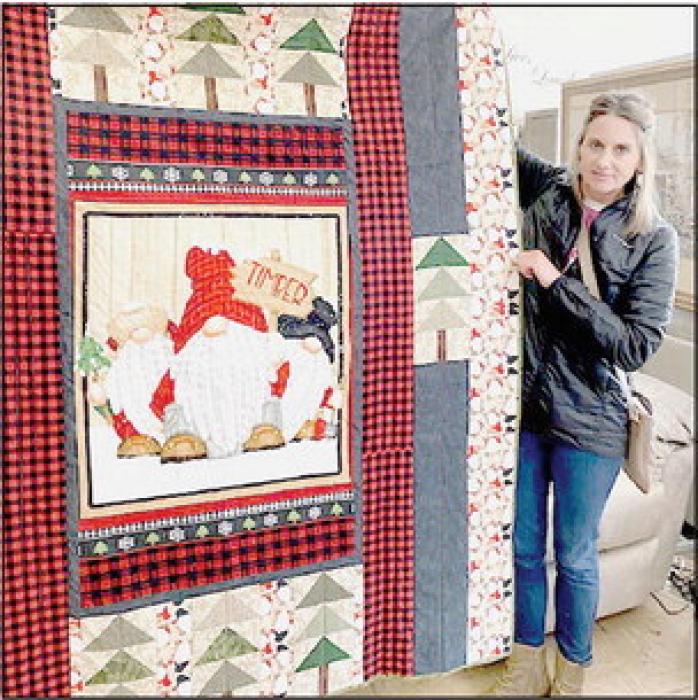 Angie Jordan’s mom Rita Jacquot won first place with a Gnome Christmas quilt.