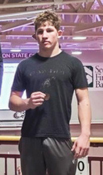 Parker Chavez placed 3rd in the 165lb bracket.