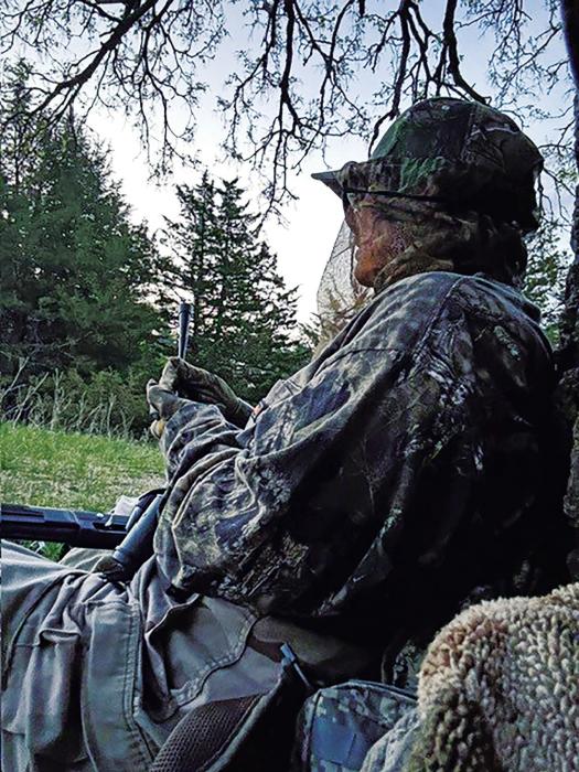 Participating in the BOW Womens Turkey Hunt Christine Lousias is calling in a gobbler.