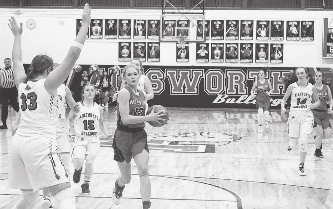 Kailee Kellum is going in around her defender for a shot Photo by Mary Reagle
