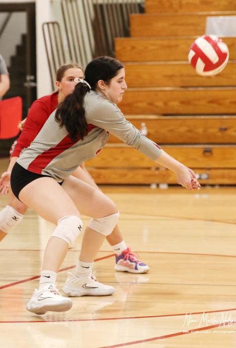 Senior Ashlyn Hutchinson #7 passing the ball.