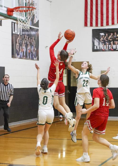 Mia Sherbeyn #24 takes a shot.