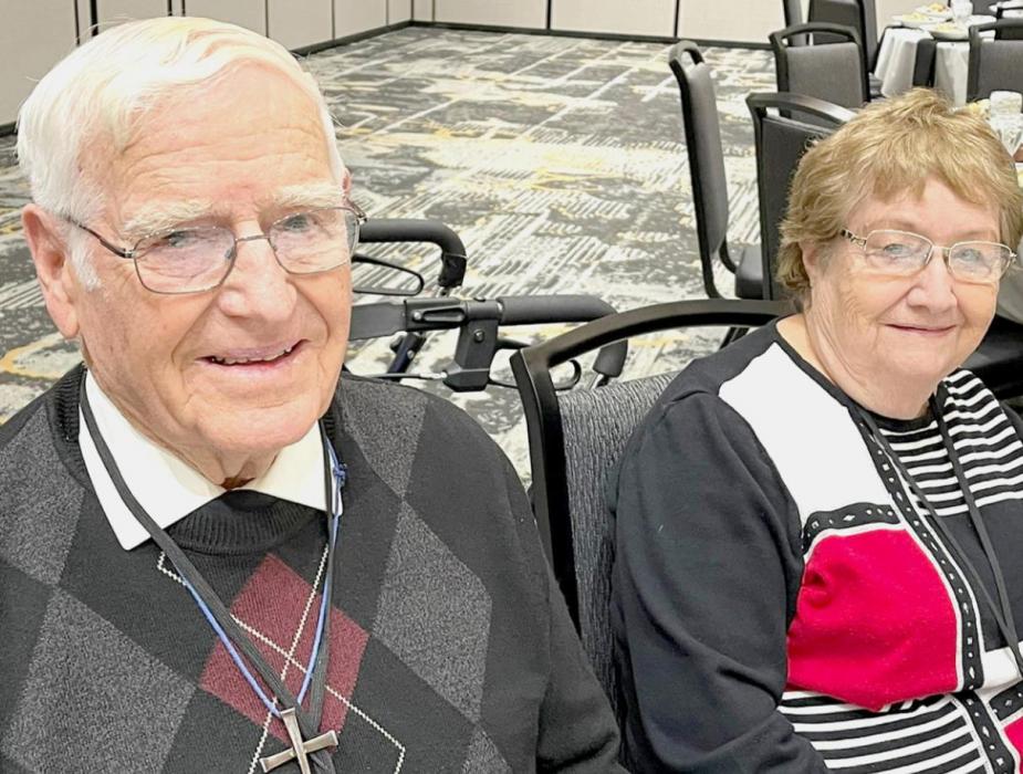 He is pictured above, after receiving his plaque, and below with his wife Evelyn.