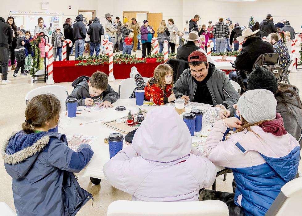Inside the 4-H Building, there were plenty of things to do - color, vote on the best tree, enjoy refreshments, and the long line in the background was to see Santa!