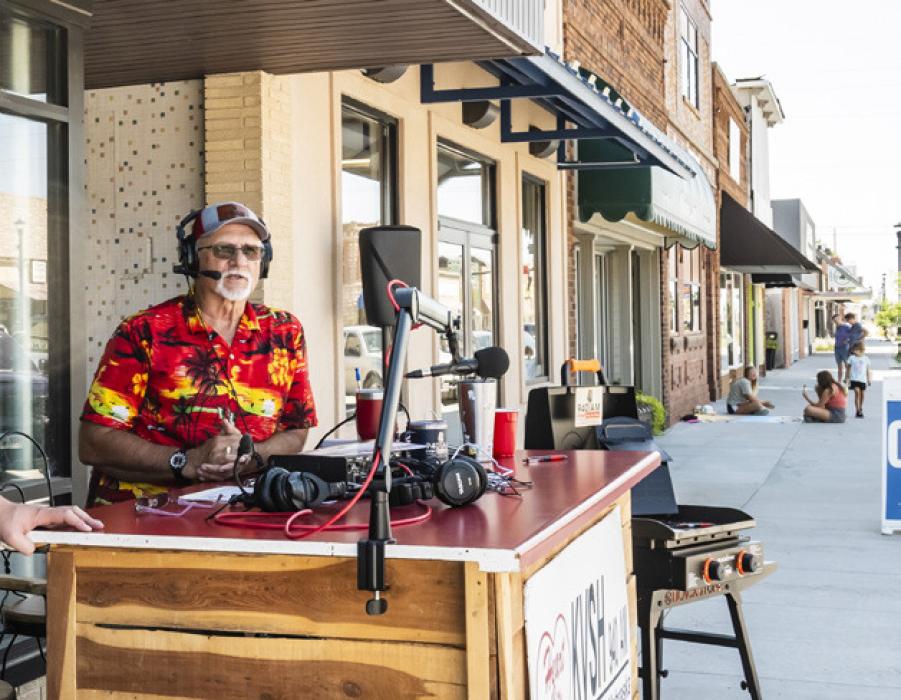 KVSH was broadcasting live in front of Nelsen Furniture. Further down the sidewalk, artists are showcasing their sidewalk chalk art.