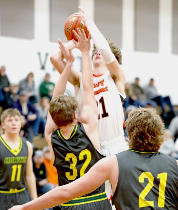 Jasper Roseberry #21 takes the ball to the hoop, draws the foul to go to the line for a three point play.