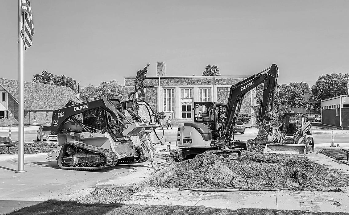 Kirk Barnes Construction readies the front of the Cherry County Justice Center for the placement of new cement and the re-homing of the veterans monuments.