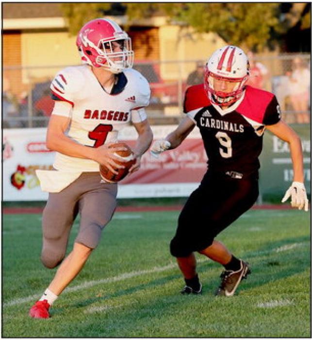 Quarterback Trace Buechle #9 is looking for an opening.