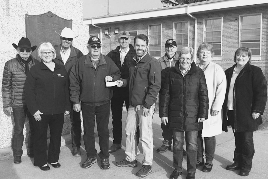 Pictured are from L to R: Bob Stetter, Nadeane Allard, John Ravenscroft, Jim Edwards, Don Nelsen, Todd Madison, Bill Marshal, Joan Johnson, Carolyn Petersen, and Ronna Morse.