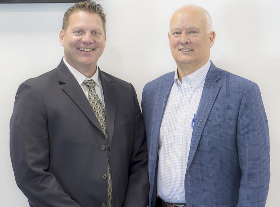 Pictured at the special Law Enforcement Coalition are FBI Assistant Special Agent in Charge Phil Lenz, and Attorney General Doug Peterson. Photo by Laura Vroman