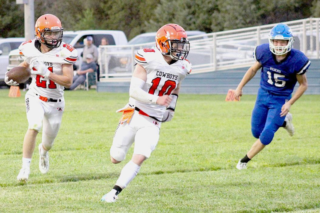 Jasper Roseberry #21, follows blocker, Cooper Fay #10, to the endzone. Photos by Shontell Roseberry