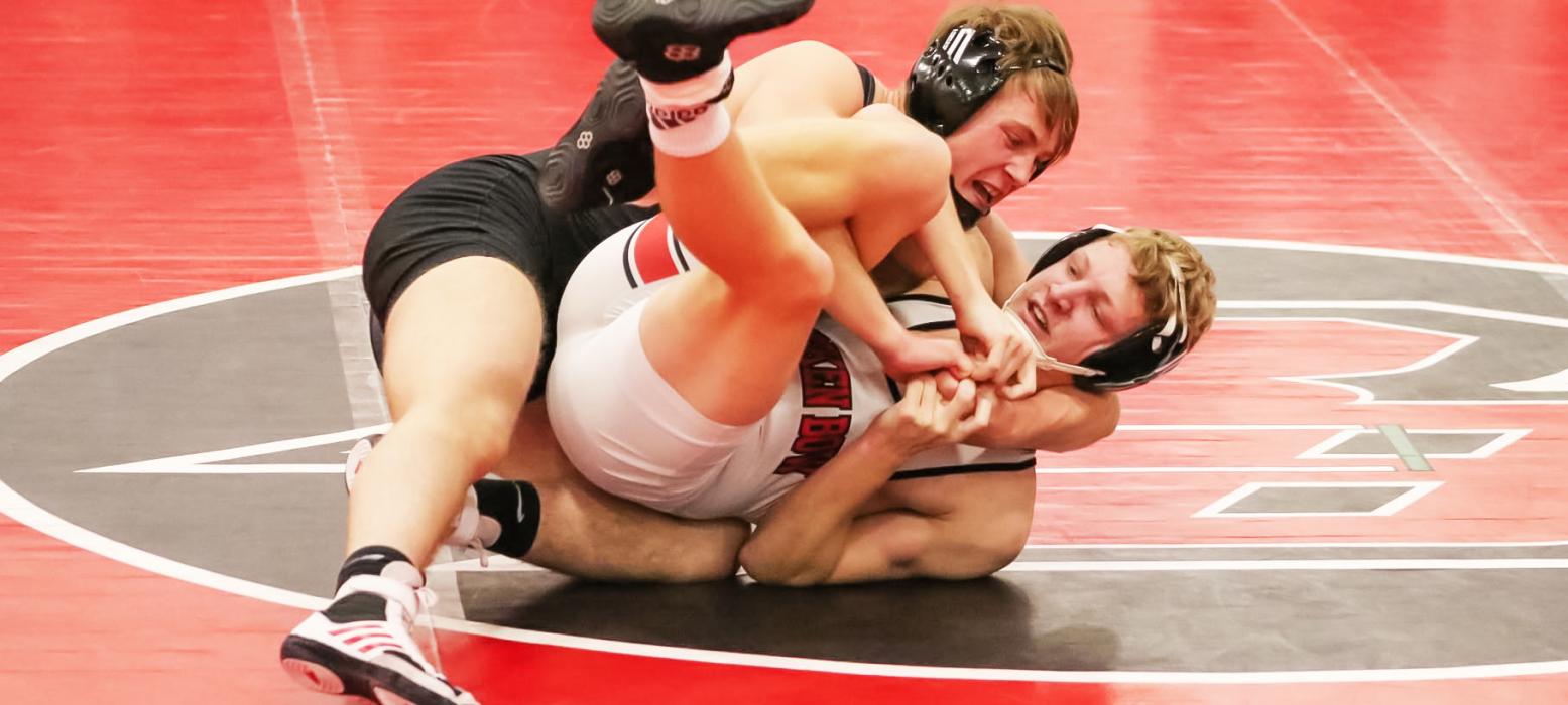 The Badger Wrestling teams traveled to Broken Bow for a triangular with Gothenburg. Both boys and girls teams won the Broken Bow dual. Clayton went 2-0 for the night. Here he pins a competitor from Broken Bow. Unfortunately, the girls didn't get the chance to wrestle Gothenburg, and the Swedes defeated the Badgers. Photos by Karen Phillips
