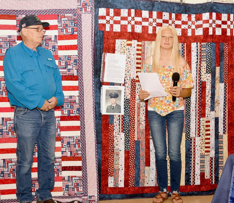 Christen Larson – Malard presents Ron Brown with his Quilt of Valor.