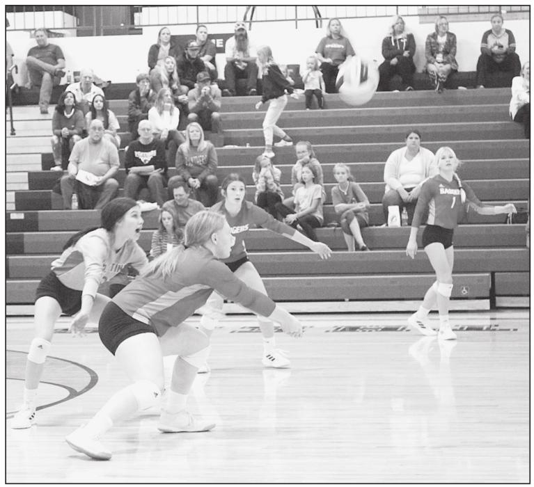 Kinsey Buechle hitting the ball over the Cody-Kilgore blocker.