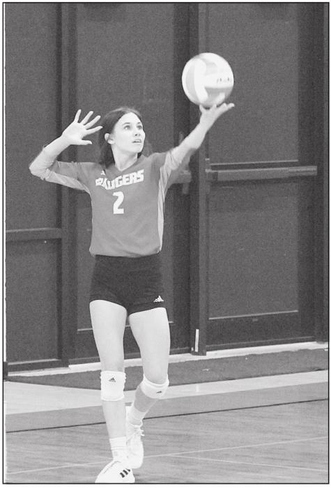 Grace Kelber serving.