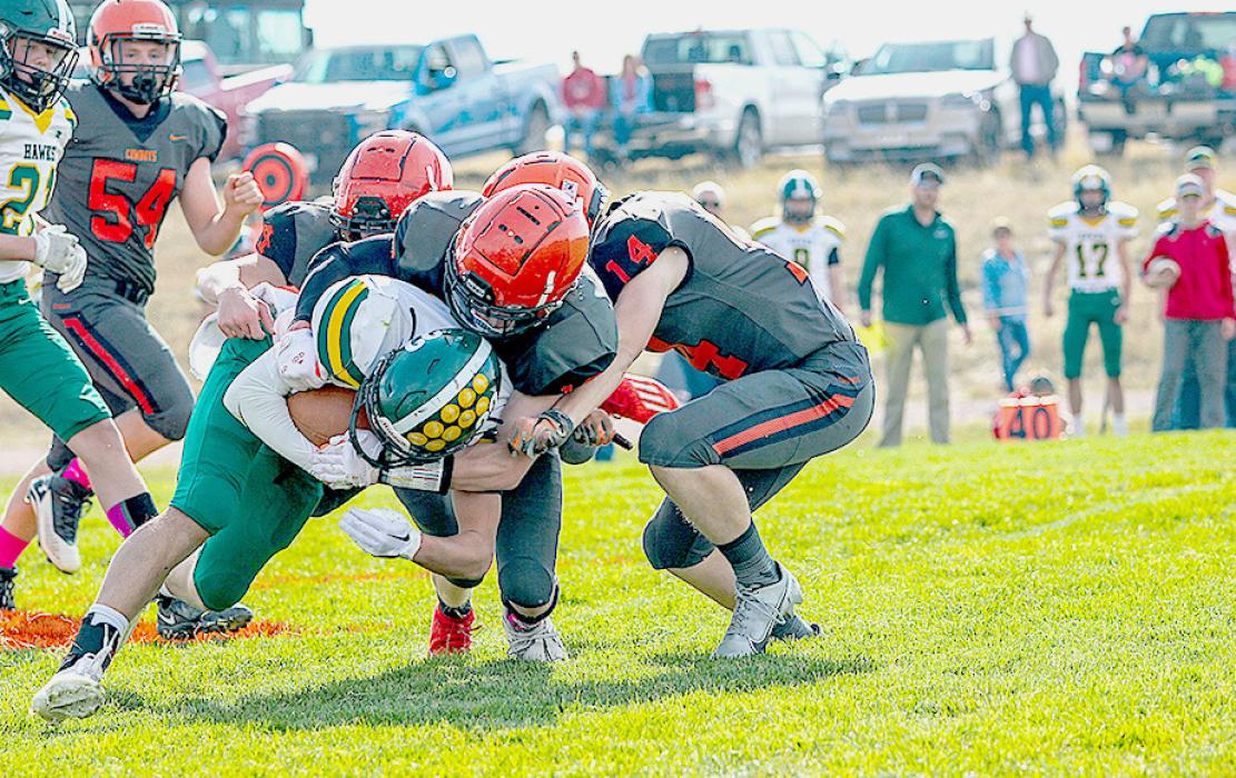 A posse of Cowboys taking down a Hay Springs Hawk. Photos by Shontell Roseberry