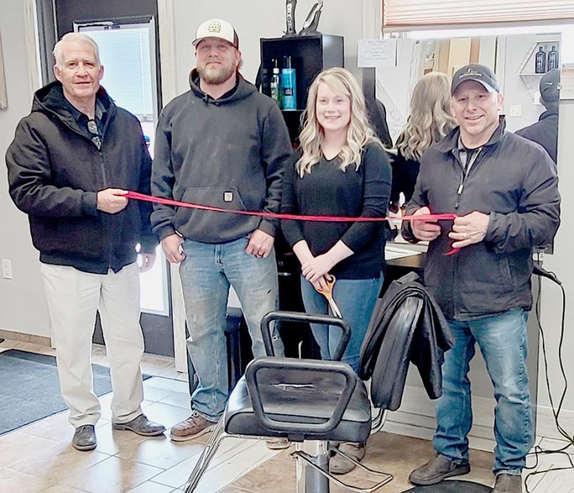 Pictured at BB Snips Ribbon Cutting are from L to R: Dean Jacobs, Jeff Ohlmann, Brittney Ohlmann, and Jason Kelber. Photo by Laura Vroman