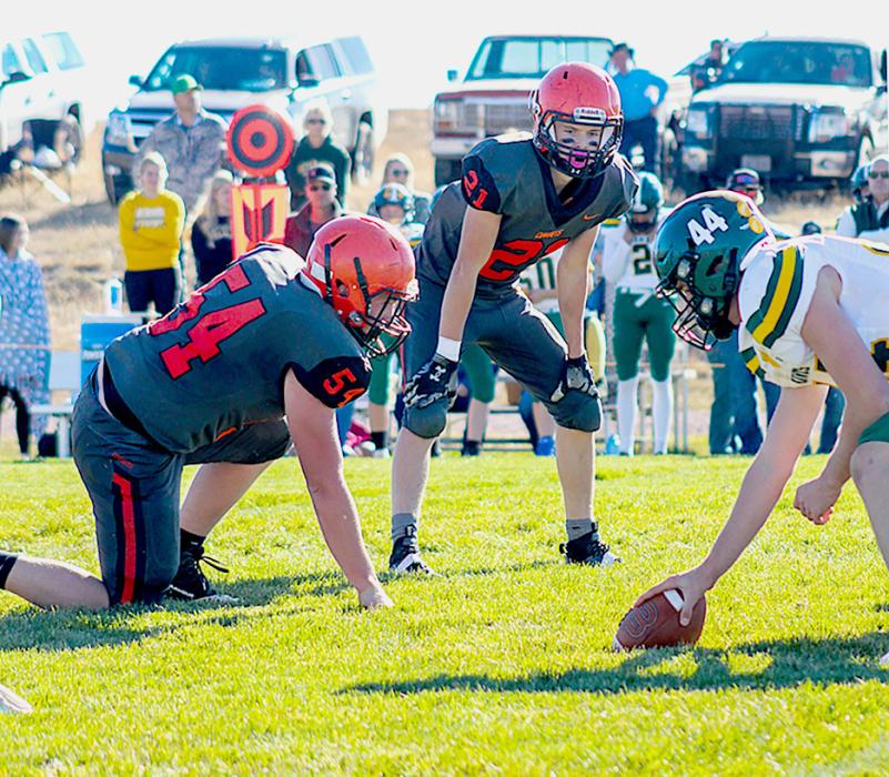 Dylan Naslund #54 and Jasper Roseberry#21 ready on the defensive line. Photos by Shontell Roseberry