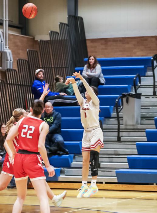 Junior Aiden Hand #2 up for a 3 pointer.