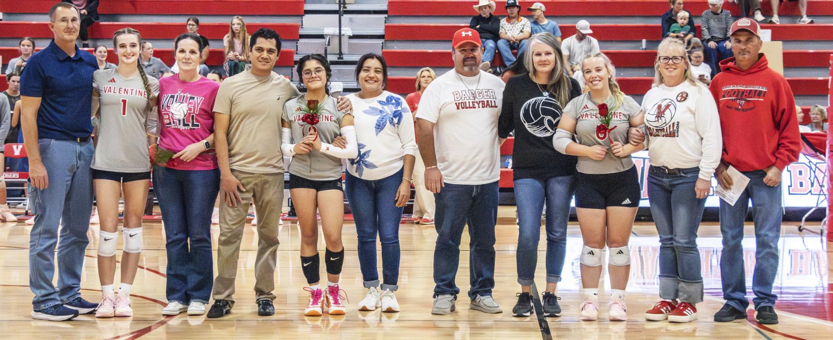 It was parents night at the Badger triangular, held Thursday, October 1, 2026. Pictured are from L to R: Paige Sprenger #1, daughter of Matt and Christy Sprenger; Ashley Mora Lira, daughter of Oscar Mora and Samantha Lira; Tygh Miller #6, daughter of Shane and Nicholer Miller and Erin Miller and Chad Brennan. Photos by Tina Boone