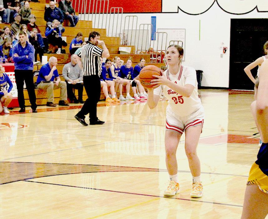 Kinsey Buechle shooting a free throw in the home game against West Holt.