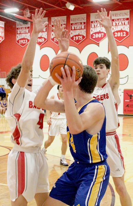 Dominic Beebout #4 and Isaac Cronin #15 have trapped their opponent in the corner.