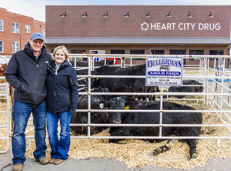 Tyler and Hilary Bullerman traveled from Adrian, MN for their first showing at the Bull Bash. Tyler said he’s sold bulls this way before and wanted to come and meet the people. The 4-H Luck of the Draw was held at Heart City Drug, with corn hole games in front for anyone who wanted to play. Photo by Laura Vroman