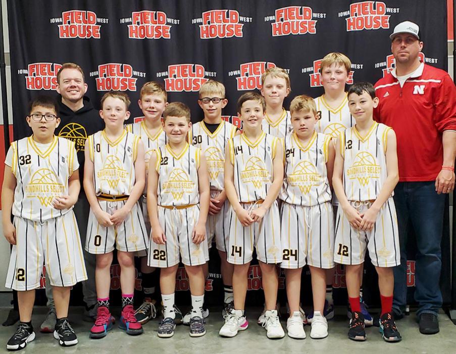 Pictured are back row, L to R: Coach Tony Galvin, Colin Bailey, Carter Anderson, Colter Austin, Aiden Buckendahl, and Trent Ford. Front row, L to R: Trevor Two Strike, Bently Ford, Nash Hesse, Ben Werner, Parker Wackler, Teagen Fish. Not pictured are Gage Sandoz, Boone Jespersen, and Cole Boes.