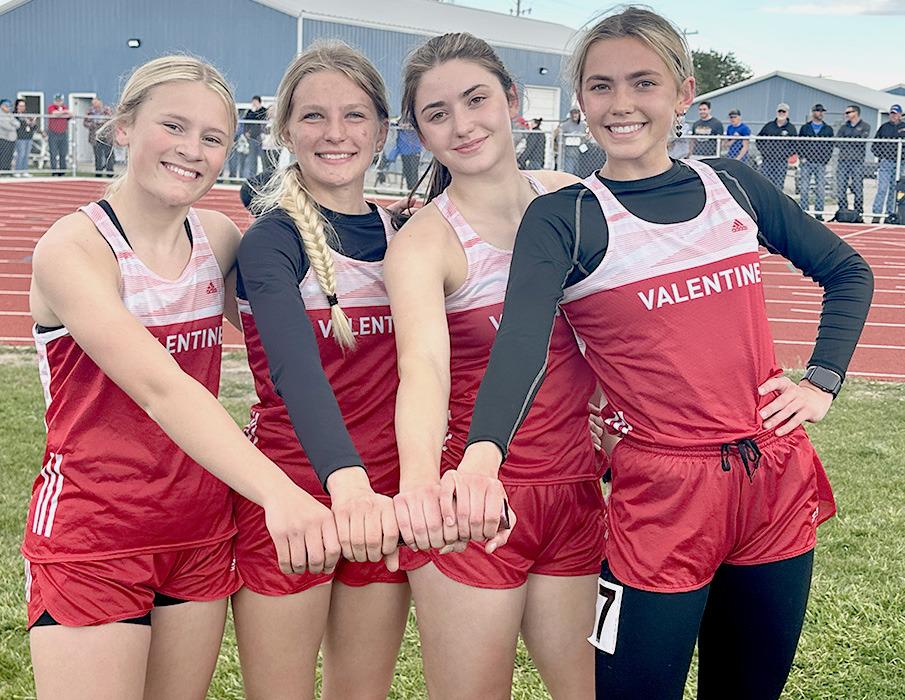 The Badger 4x400 team is pictured from L to R: Joni Cox, Christen Larson, Alivia Patterson and Maeli Patterson.
