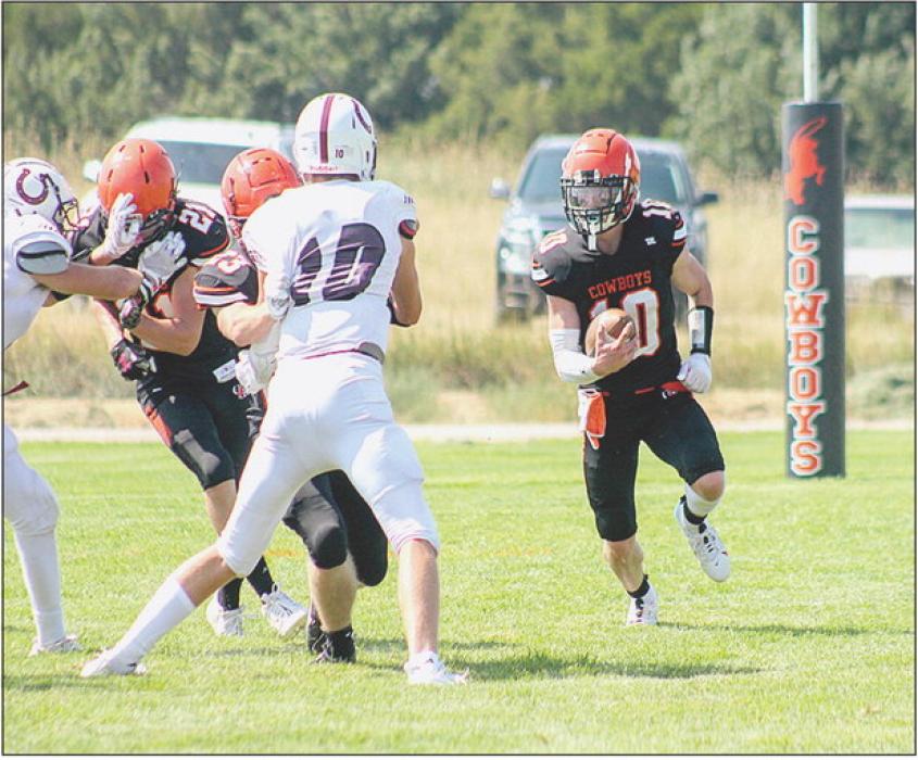 Cowboy linemen making a path for Cooper Fay #10 in the game against the Stuart Broncos, September 8, 2023. The Cowboys lost with a score of 27-35. Friday, September 15, 2023, the Cowboys traveled to Santee and won with a score of 52-12. Scoring by quarters: Cody-Kilgore - 6, 18, 22, 6 = 52; Santee - 0, 6, 6, 0 = 12. Friday, September 22, the team will host Minatare.