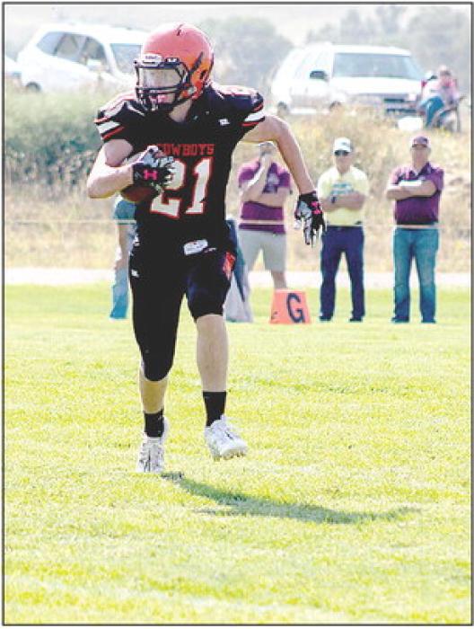 Jasper Roseberry #21 looking to make his way down the field in the game against the Stuart Broncos. Photos by Shontell Roseberry