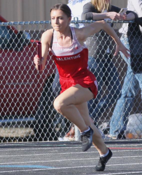 MaKenzie Long competes in the 4x400 Meter Relay where the Valentine team took first place.
